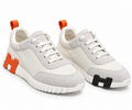 Hermès Bounce Low-Top Sneakers – Ivory & Orange